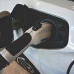 Electric car charging port plugged in